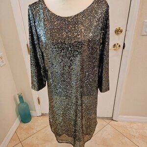 How sharp is this??  Gold sequinned cocktail dress.  Wow!